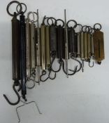 Seventeen Salter spring balances including chrome and nickel plated examples, steel examples, letter