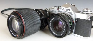 Canon AV-1 SLR camera with 50mm 1:1.8 lens and a Tokina 70-210mm 1:4-5.6 lens