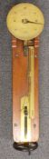 Salter's improved dynamometer, with brass dial and on wooden mount with hand wheel to base, to