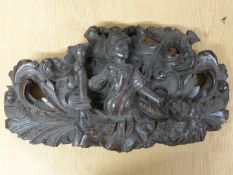 A 17thC carved oak finial, 24x55cm