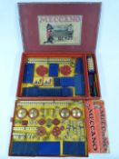 Meccano Outfit F with blue and gold parts, in original box with instructions.