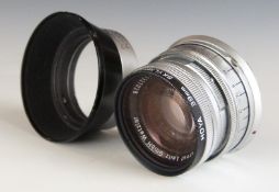Leitz Summicron f=5cm 1:2 camera lens, serial number 1327028, with Leica M mount, together with caps