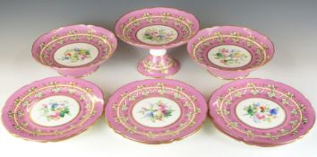 A 19th/20thC porcelain dessert service hand decorated with flowers on a pink ground comprising six