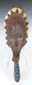 African tribal elongated carved mask with geometric designed head dress, H51cm