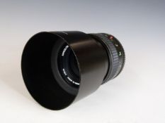 Minolta Tele Rokkor 100mm 1:2.5 SLR camera lens