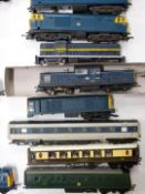 Over forty Tri-ang and Hornby 00 gauge model railway locomotives together with various loose bodies.