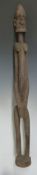 African tribal carved figure of elongated form, probably 19thC, H120cm