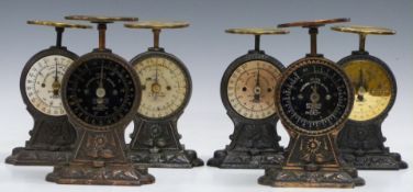 Six Salter No 11 letter balances, all to weigh 24oz and with cast decorative bases, one marked W.H.