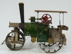 Meccano or Butcher & Sons Primus model of a steam roller made using red, green and black parts, 43cm
