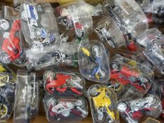 Thirty-five Maisto diecast model motorbikes including Yamaha, Kawasaki Ninja, Boston Police,