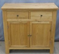 Modern light oak or similar sideboard two drawers above cupboards, W96 x D40 x H90cm