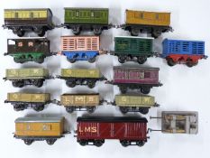 Fifteen Hornby 0 gauge model railway wagons and vans including SR, LMS, GW, MR, Southern 6T 2435 etc