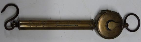 Tozer's patent combined spring balance and tape measure with maximum parcel sizes listed on one side