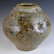Mike Dodd (b 1943) studio pottery crackle ash glazed globular vase with irregular indentations,