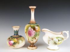 Two Royal Worcester vases and a pedestal jug, all with hand decoration of roses in the style of