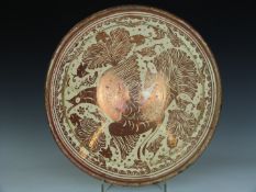 An 18th/19thC Hispano Moresque (Moorish) large pottery bowl, with copper lustre decoration of a