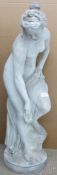 A stone garden statue of a semi nude maiden in the classical style, H84cm
