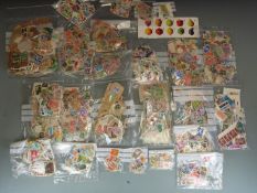 A box of loose GB, Commonwealth and Foreign stamps in packets