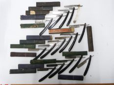 Sixteen boxed cut throat razors to include John & William Ragg Napoleon razor, T Gerrard & Co.