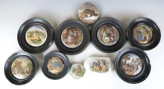 A collection of ten Prattware pot lids, most framed