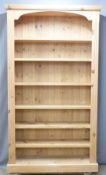 Three pine bookcases each approximately, W120 x D34 x H212cm