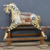 19th/ early 20thC wooden dapple grey painted rocking horse on wooden swing base with metal fittings,