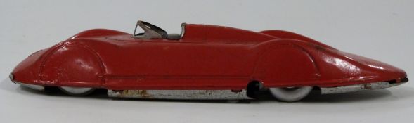 German clockwork tinplate Auto Union Audi streamlined racing car with red body and driver, 24cm