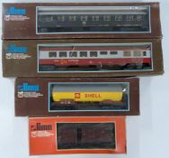 Four Lima 0 gauge model railway continental passenger coaches and rolling stock including Shell