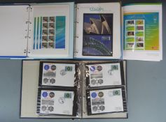 Sydney 2000 Olympic Games. Two Prestige stamp albums of gold medallist mini sheets and covers, an