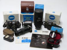 Two Minolta X-700 SLR cameras one with 50mm 1:1.7 lens, Tokina 28-135mm f 4-4.6 and TM500 500mm f