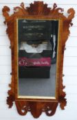 A mahogany bevelled glass wheatear mirror with crossbanded rosewood and gilt decoration, 124x63cm