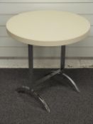 A designer circular side table with stainless steel frame, probably Philippe Hurel, Paris,