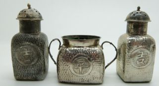 Chinese hammered white metal cruet with Chinese character decoration and impressed marks to base,