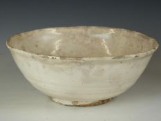 Chinese Han dynasty ribbed pedestal bowl with cream glaze
