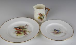 Royal Worcester porcelain plates and jug, all with decoration of garden birds including a