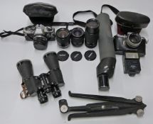 Olympus OM10 SLR camera with 50mm 1:1.8 lens and Vivitar 1:3.5-4.5 28-70mm lens,  Pedixa Prismat TTL