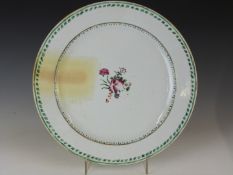 A 19thC Chinese famille rose charger with leaf border, diameter 37cm