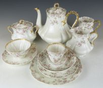 An extensive Limoges tea set including teapot, jugs etc and two Royal Worcester boxed sets of tea