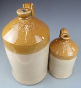 Two stoneware flagons, H.J.Berry New Inn Gloucester and F.W Taylor Grocer, Ledbury, tallest 40cm