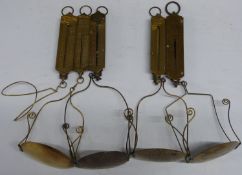 Five Victorian and later Salter postage or letter spring balances, some with pan and letter rack