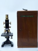 Charles Perry microscope in original fitted and numbered mahogany case, 7221 impressed on the