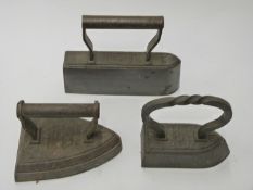 Three large Salter flat irons comprising 14, 18 and 10, length of longest 15cm