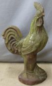 An antique cast iron cockerel garden ornament, possibly Courage Beer advertising, H63cm