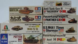 Nine 1:35 and 1:48 scale plastic model tank kits comprising two Italaeri, two Tamiya, four Bandai