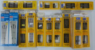 Twenty-eight sets of Peco Streamline 00 gauge model railway points, all in original boxes.