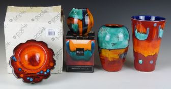 Four pieces of Poole pottery comprising Gemstones purse vase and dish and two vases, tallest 20cm