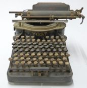 Vintage Yost typewriter, likely No4 with circular arrangement of letters and ribbon free operation