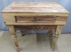Eastern hardwood side table with single frieze drawer, raised on reeded legs, W99 x D67 x H96cm