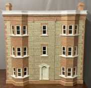 A scale model dolls' house, believed to be a replica of Linden House, Gorsley, Gloucestershire, with