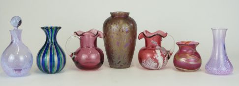 Seven pieces of coloured and iridescent glass comprising Okra and Royal Brierley vases, a pair of